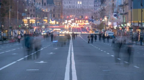The anonymous smashed people crowd stream on the road. Evening time. Time lapse Video stock 68979077