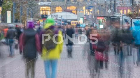 The anonymous smashed people crowd stream. Telephoto lens shot Stock Photos