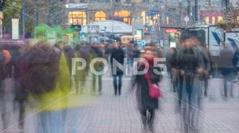 The anonymous smashed people crowd stream. Telephoto lens shot Stock Photos