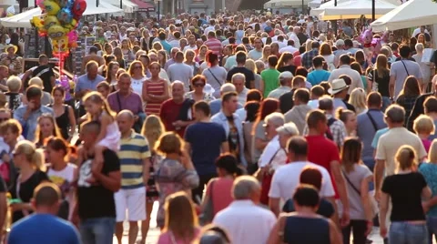 Anonymous street crowd backlight shot Stock Footage 52970686