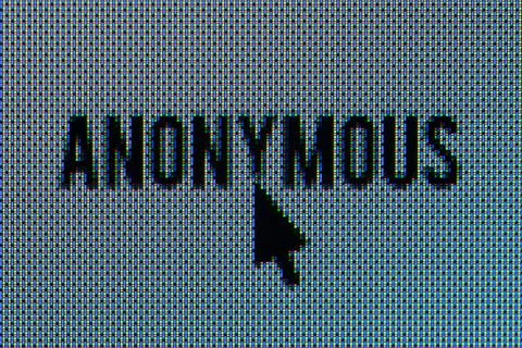 Anonymous text super macro in OLED screen with mouse Foto stock