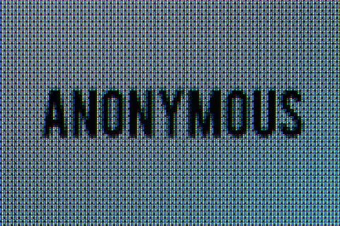 Anonymous text super macro in OLED screen Stock Photos
