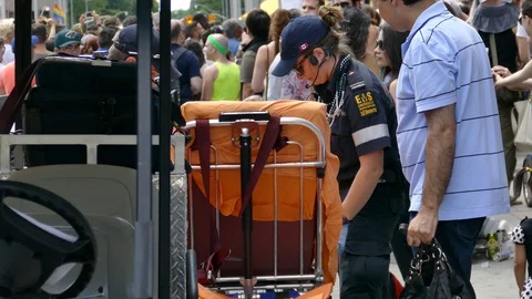 Anonymous view of patient being helped by female paramedic Video stock 88417338