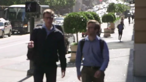 Anonymous Walking Down the Street of San Francisco Stock Footage 131356379