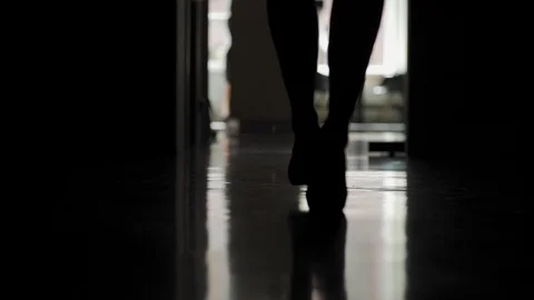 Anonymous woman walking down office corridor Stock Footage 112118853