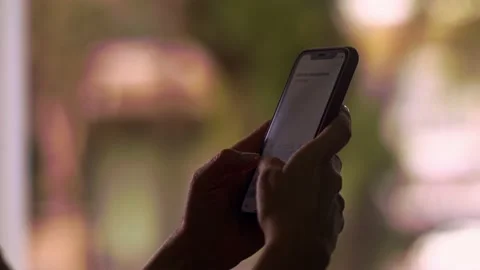 Anonymous woman's hands typing notes in iPhone notes application Stock Footage 205344777