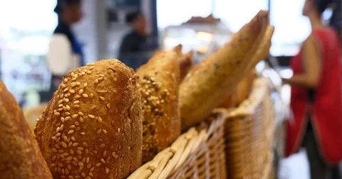 Anonymous worker serving bakery Stock Footage 83926345