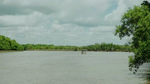 Another beautiful day, the sky is blue and the water is flowing slowly Stock Footage 163984099