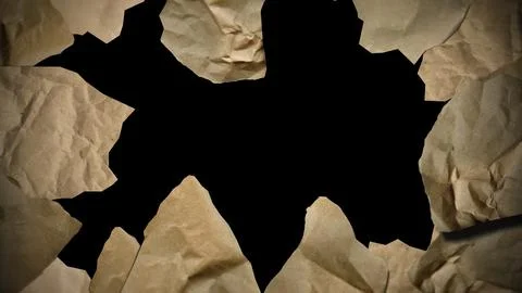 Another image of crumpled paper textures, highlighting torn areas for creative Stock Photos