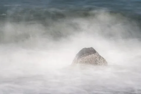 Another rock in the surf - impression Foto stock
