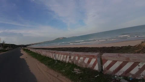 Another Section of Cinematic Golden Hour Motorbike POV on Mui Ne Ocean Road Stock Footage 339989698