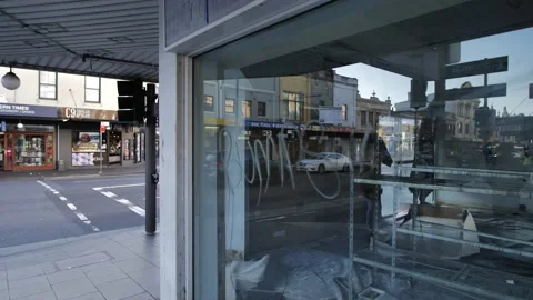 Another shop closed down during the recession slow motion tracking shot 4K Stock Footage 220430554