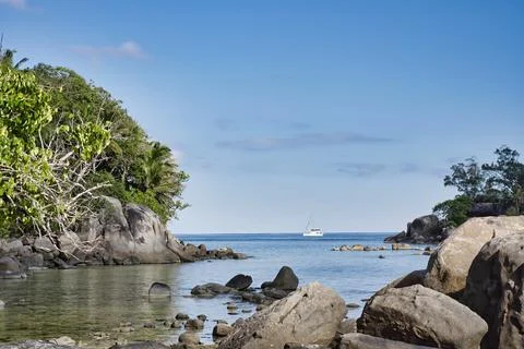 Anse royale, passing yatch Stock Photos