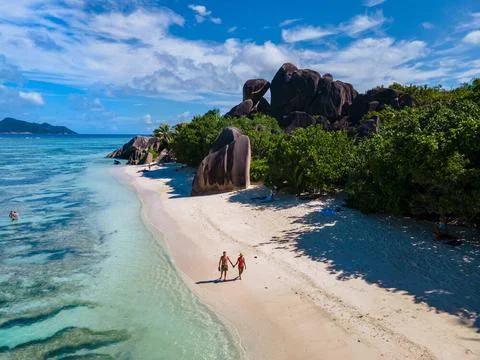 Anse Source d Argent, La Digue Seychelles, young couple men and woman on a... 写真素材