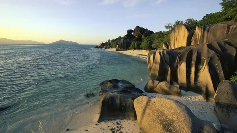 Anse Source D'argent beach on La Digue island during sunset, Seychelles Stock Footage