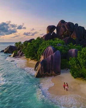 Anse Source d'Argent, La Digue Seychelles, young couple men and woman on a Stock Photos