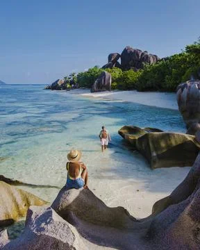 Anse Source d'Argent, La Digue Seychelles, young couple men and woman on a Stock Photos