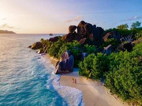 Anse Source d'Argent, La Digue Seychelles, a young couple of men and women on a Stock Photos