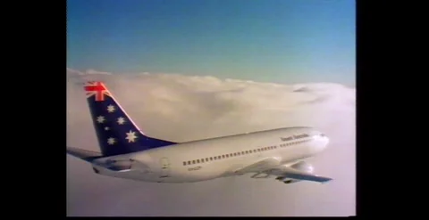 Ansett Boeing 737 Flying Through Clouds 1997 Stock Footage 317804166