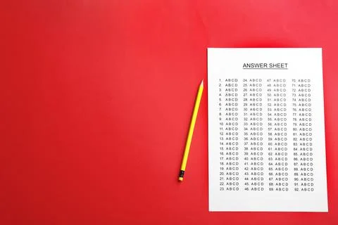 Answer sheet and pencil on color background, top view with space for text Stock Photos