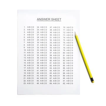 Answer sheet with pencil on white background, top view 写真素材