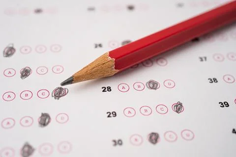 Answer sheets with pencil drawing fill to select choice, education concept Stock Photos