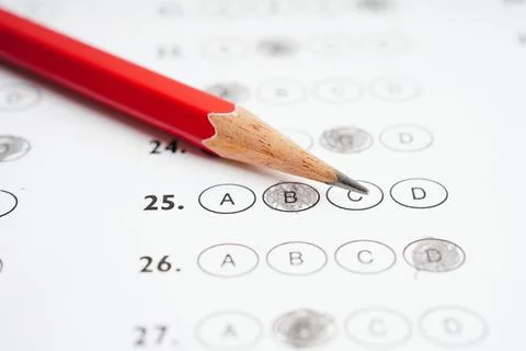 Answer sheets with pencil drawing fill to select choice, education concept. Stock Photos
