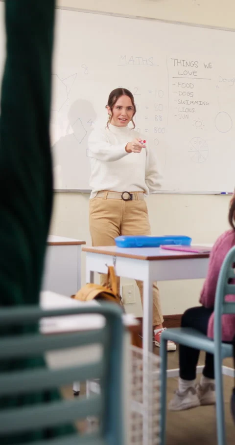 Answer, teaching and children in classroom at school for learning, test or quiz Stock Footage 335898310