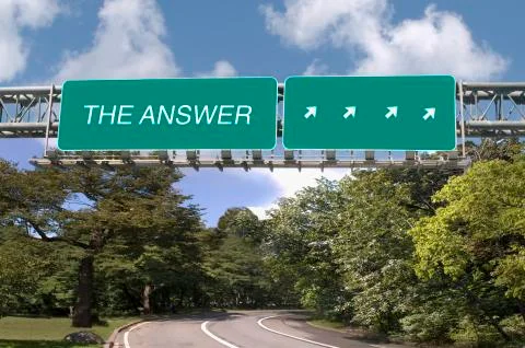 The answer written on highway sign Stock Photos