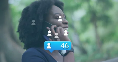 Answering call causing tech alert bubble rising count with orbiting icons and Stock Footage 313149624