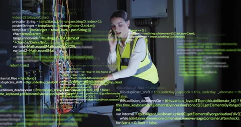 Answering call, IT tech kneeling rack testing cables while code overlay Stock Footage 312230085