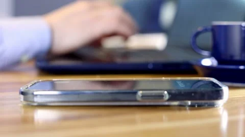 Answering cell phone - slow Stock Footage 324283732