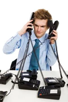 Answering multiple calls at the same time Stock Photos