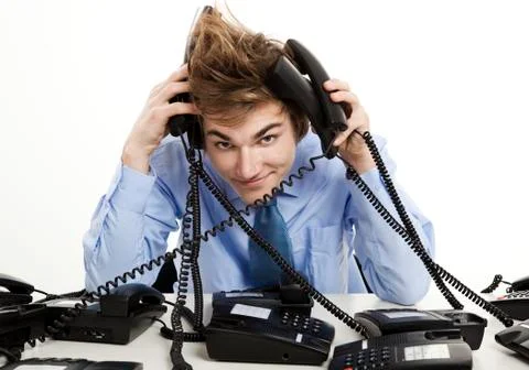 Answering multiple calls at the same time Stock Photos