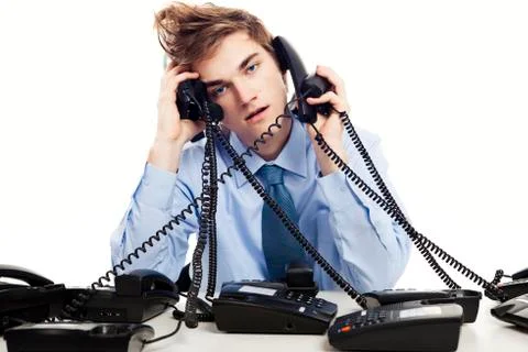 Answering multiple calls at the same time Stock Photos