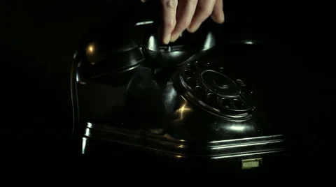 Answering vintage telephone phone call Stock Footage