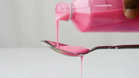 Antacid in a spoon Stock Footage 220704061