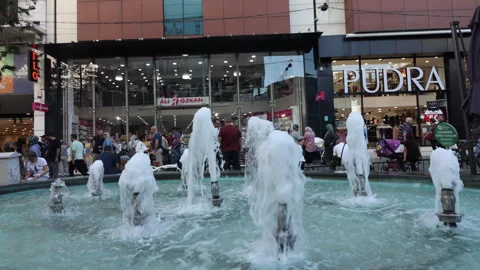 Antalya in the fall. Trade centers along the road.  A working fountain is i.. Stock Footage 259825513