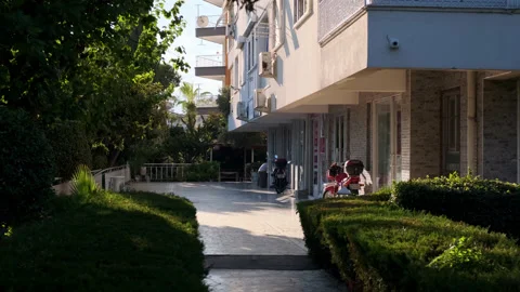 Antalya, Turkey - CIRCA 2022: Nice courtyard of small residential building in Stock Footage 227726852
