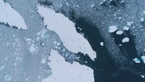Antarctic drone flight over float ice ocean Stock Photos