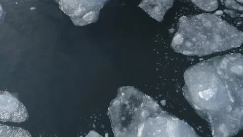Antarctic drone flight over float ice ocean Stock Photos
