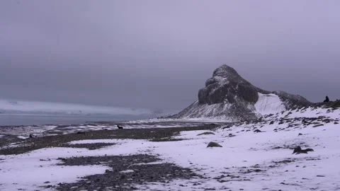 Antarctic expedition. Mountain view with snow and clouds over rocky landscape Stock-Footage 333199015