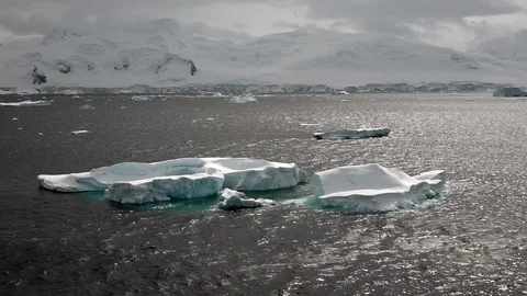 Antarctic Iceberg Floats Past 스톡 동영상 106936191