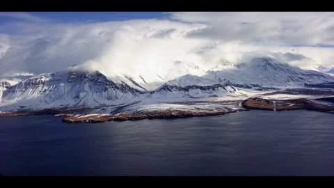 Antarctic landscape. The scene features a vast, snow-covered mountain. Stock Footage 297843664