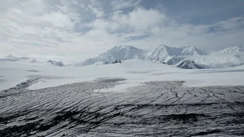 Antarctic landscape. The scene features a vast, snow-covered mountain. Stock Footage 297846669