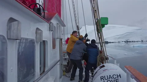 Antarctic Peninsula – 2026/02/18: Sailors Pulling Ropes to Raise Ship Sails 스톡 동영상 341580256