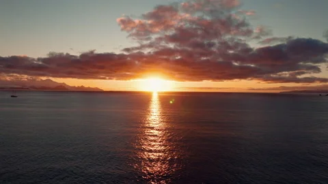 Antarctic Sunset Over Ocean with Distant Sailboat Vídeos de archivo 335080413