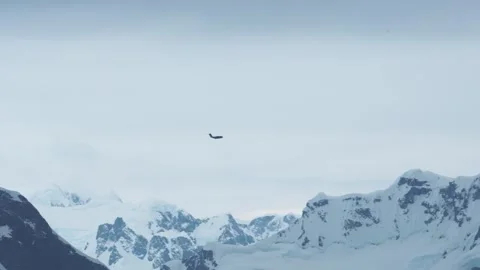 Antarctica Black Plane Flies. Close View Camera Follows Over Beautiful Glacier,  Stock Footage 344463160