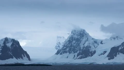 Antarctica Black Plane Flies Over Beautiful Glacier, Snow, Ice, Mountain Range.  Stock Footage 344463139