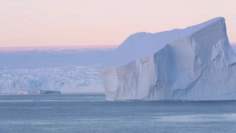 Antarctica Huge Tabular Icebergs at Sunset. Beautiful Snow Covered Mountain.. Stock Footage 342657889